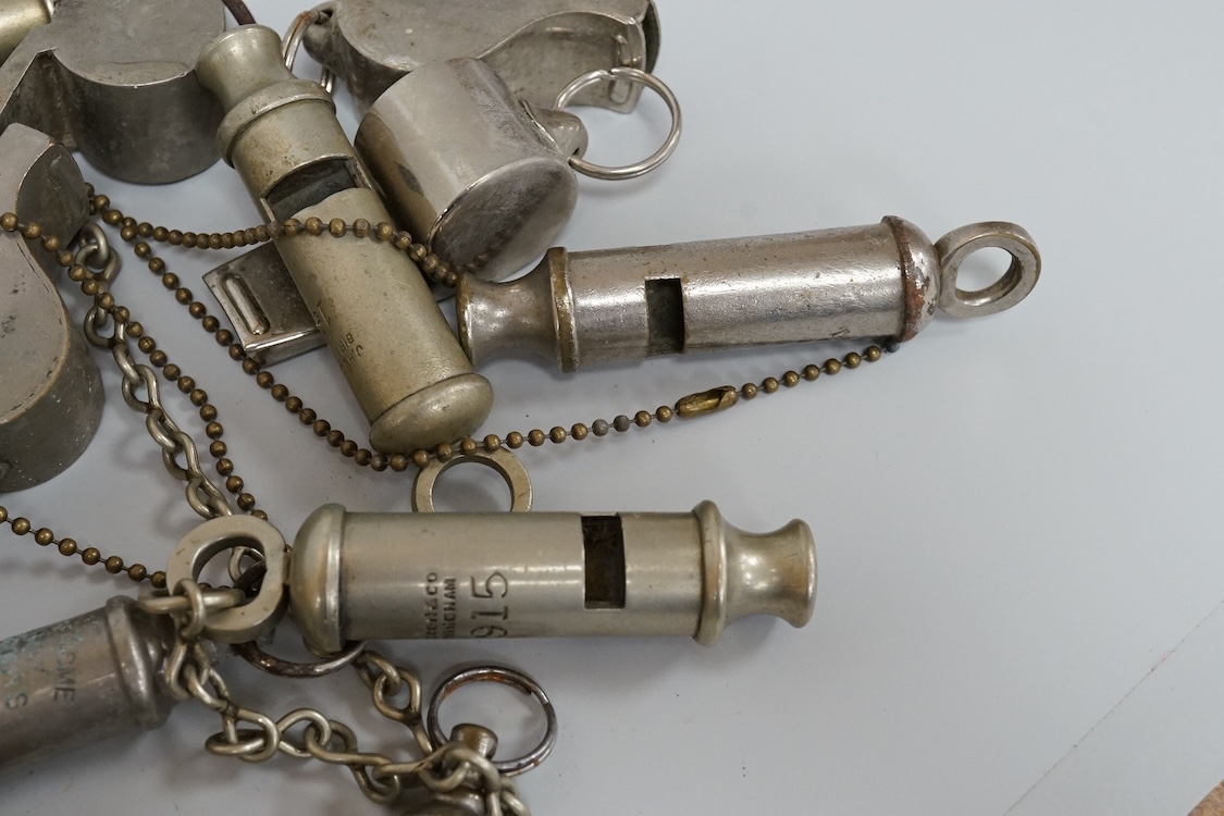 A collection of assorted penknives and whistles